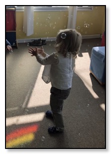 Arrow chasing bubbles at music class Feb 2018