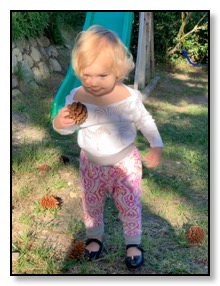 Azelle with pinecone April 2020