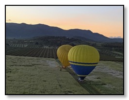 balloons lifting off behind ours