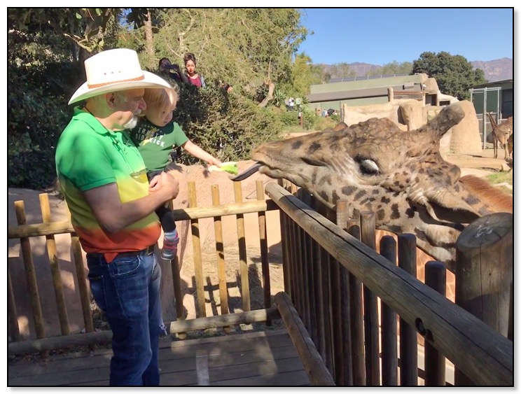 dan and arrow feeding giraffe Jan 2018