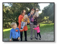 dan and nazy and grandchildren outdoors