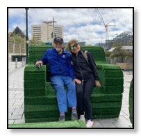 Dan and Nazy on BIG chair in Christchurch