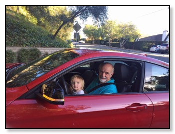 Dan and Tiger driving red car Feb 2016