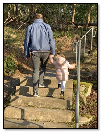 Darius walking up the stairs with Auriane march 2021