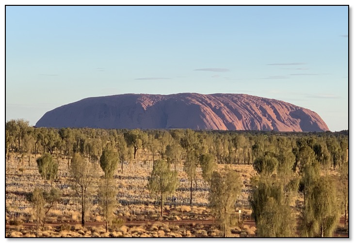 Uluru at sunset almost set